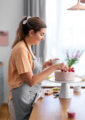 Image showing woman cooking food and baking on kitchen at home