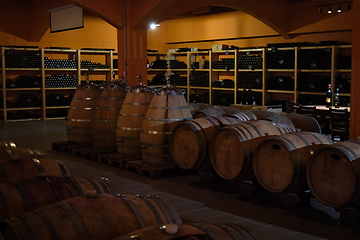 Image showing Winery cellar with wine barrels