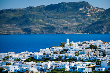 Image showing View of Plaka village with traditional Greek church. Milos island, Greece