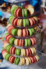 Image showing Selection of decorative desserts on buffet table at catered event