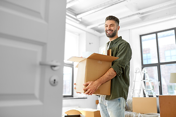 Image showing happy man with box moving to new home