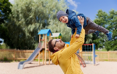 Image showing father with son playing and having fun outdoors