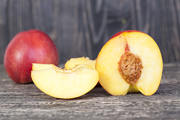 Image showing several bright red nectarines