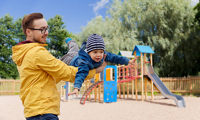 Image showing father with son playing and having fun outdoors