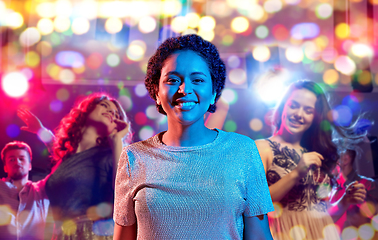 Image showing african woman over neon lights at nightclub