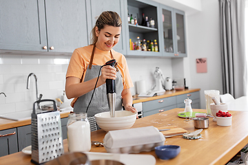 Image showing woman cooking food and baking on kitchen at home