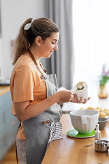 Image showing woman cooking food and baking on kitchen at home