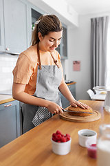 Image showing woman cooking food and baking on kitchen at home