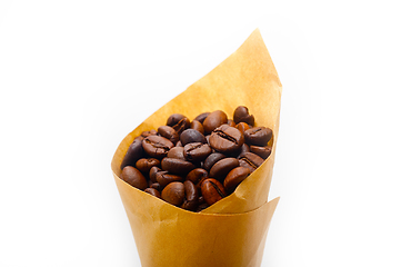 Image showing espresso coffee beans on a paper cone