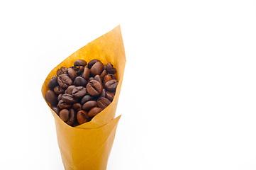 Image showing espresso coffee beans on a paper cone