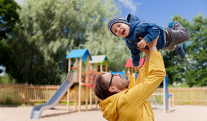 Image showing father with son playing and having fun outdoors