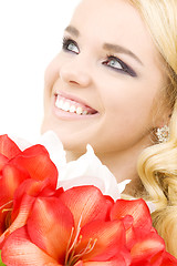 Image showing happy woman with lily flowers