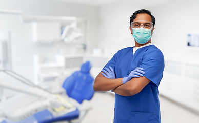 Image showing indian male doctor in mask at dental office