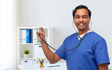 Image showing happy indian male doctor or nurse with stethoscope