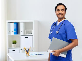 Image showing happy indian doctor with folder and stethoscope