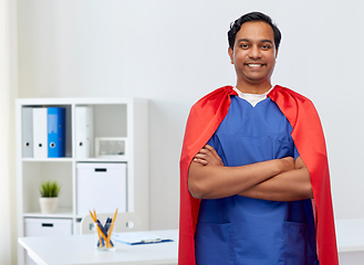 Image showing smiling doctor or male nurse in superhero cape