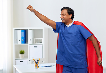 Image showing smiling doctor or male nurse in superhero cape