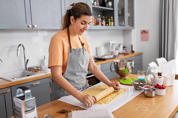 Image showing woman cooking food and baking on kitchen at home