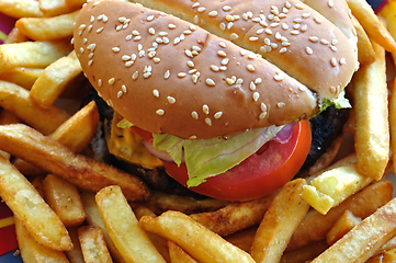 Image showing cheeseburger and chips