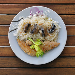 Image showing chicken breast with mushrooms and white sauce