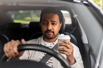 Image showing indian man or driver with coffee driving car