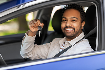 Image showing smiling indian man or driver showing car key