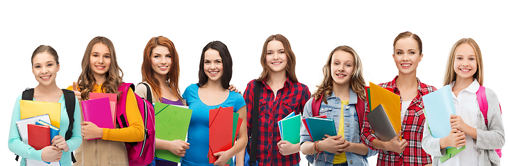 Image showing teenage student girls with bags and notebooks