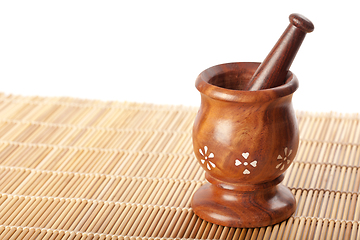 Image showing Wooden mortar with pestle