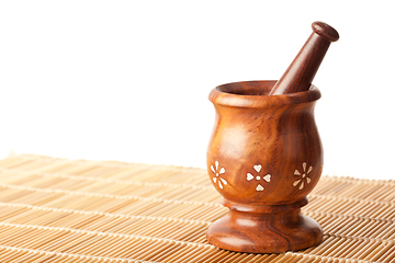 Image showing Wooden mortar with pestle