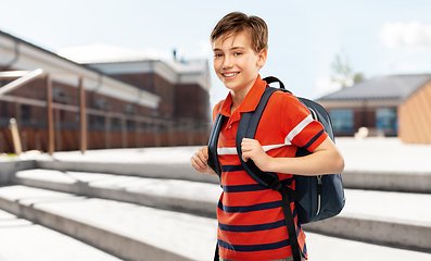Image showing smiling student boy with backpack