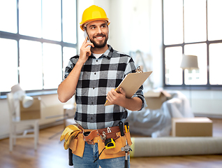 Image showing builder calling on smartphone at home