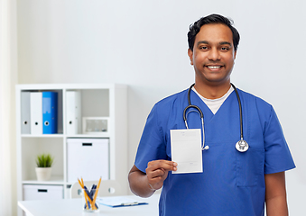 Image showing indian doctor or male nurse with prescription