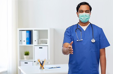 Image showing indian male doctor in blue uniform and mask