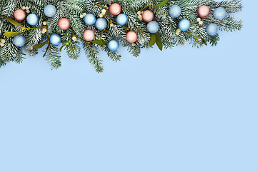 Image showing Christmas Festive Background with Snow Fir and Tree Baubles