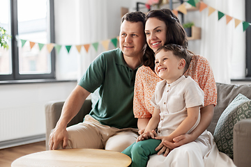 Image showing happy family with little son at birthday party