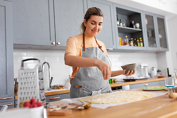 Image showing woman cooking food and baking on kitchen at home