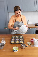 Image showing woman cooking food and baking on kitchen at home