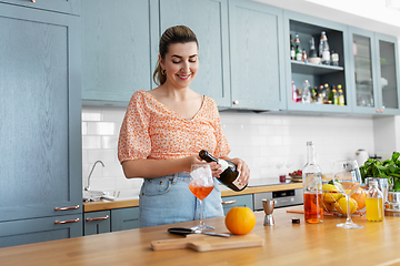 Image showing woman making cocktail drinks at home kitchen