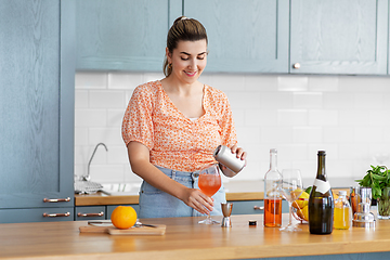 Image showing woman making cocktail drinks at home kitchen