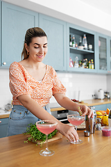 Image showing woman making cocktail drinks at home kitchen