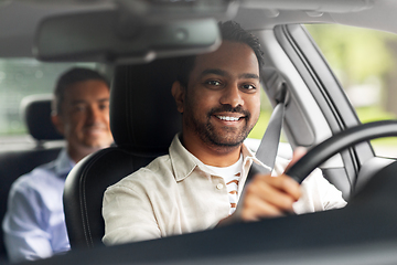 Image showing indian male driver driving car with passenger