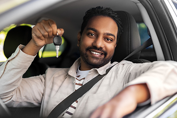 Image showing smiling indian man or driver showing car key