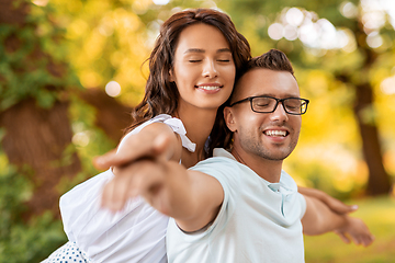 Image showing happy couple having fun at summer park