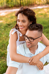 Image showing happy couple hugging at summer park