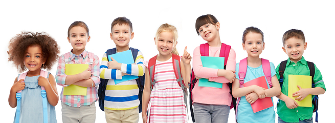 Image showing happy children with school bags and notebooks