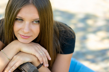 Image showing Close-up portrait of a beautiful girl of Slavic appearance, the girl has a thoughtful look