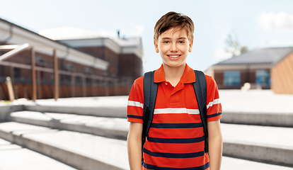 Image showing smiling student boy with backpack