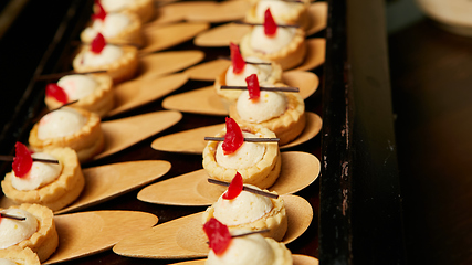 Image showing Canapes with dessert on the banquet table.