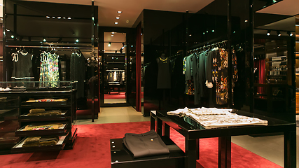 Image showing bright and fashionable interior of shoe store in modern mall