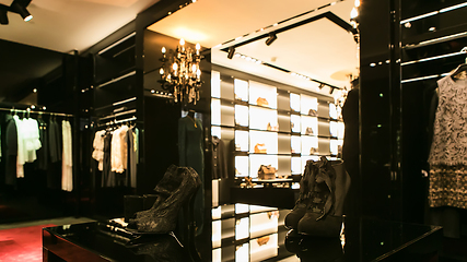 Image showing bright and fashionable interior of shoe store in modern mall